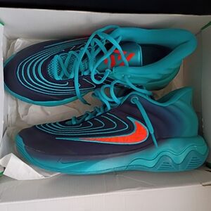 Nike Turquoise and Navy Sneakers with Orange Accent